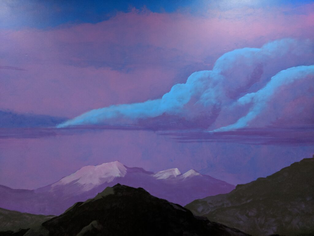 Mountain and cloud mural detail.