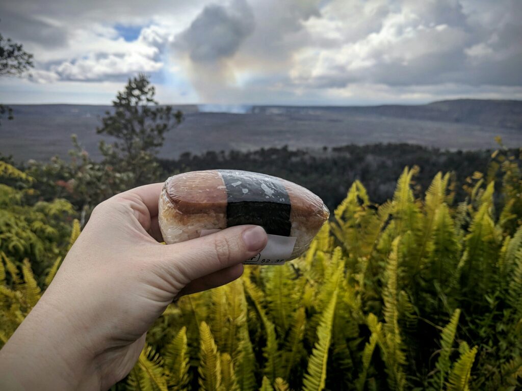 Eating a local snack, musubi, while overlooking the caldera.