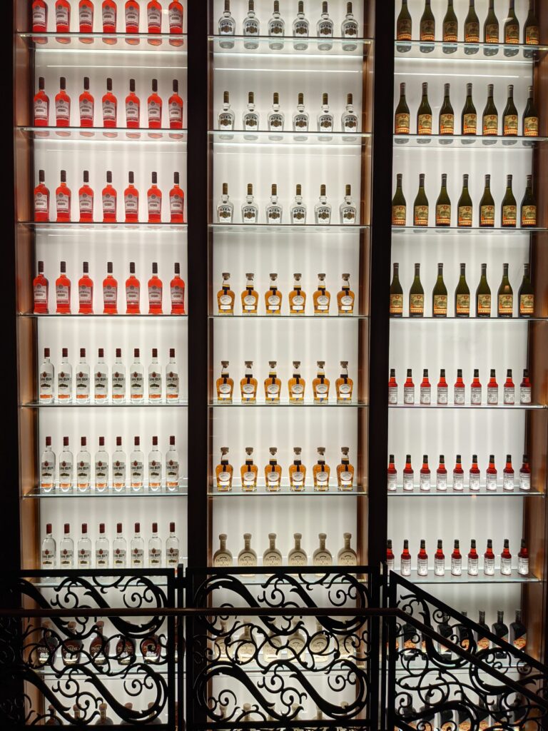 Bottles line the stairwell at the Sazerac House in New Orleans.