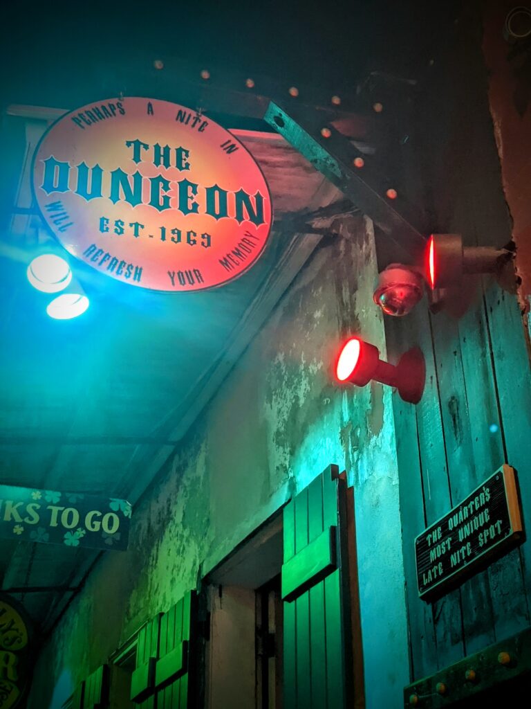 Sign leading to The Dungeon, the metal bar of New Orleans.