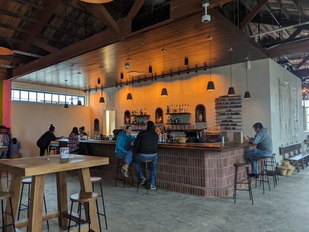 View of the bar in the tasting area at Idle Beer Hall & Brewery in San Antonio, Texas.